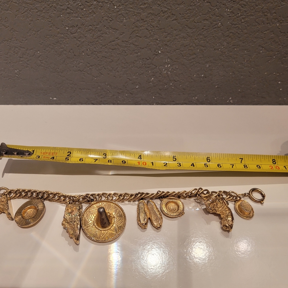 Vintage hats and shoes, goldtone charm bracelet marked GERMANY